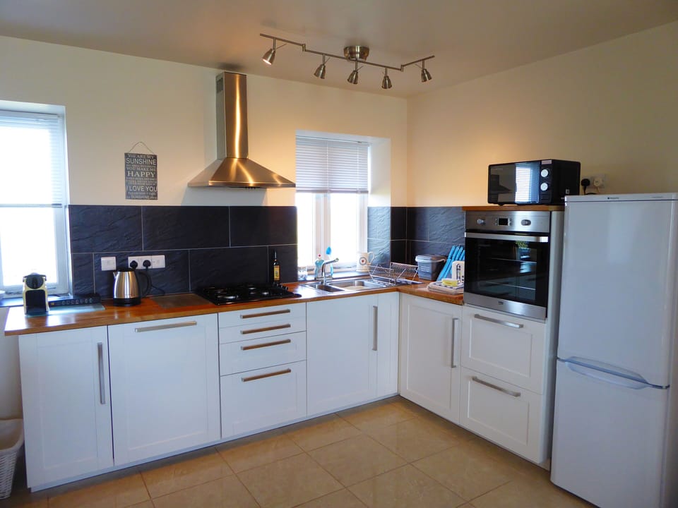 The kitchen is well equipped and includes a dishwasher and nespresso machine
