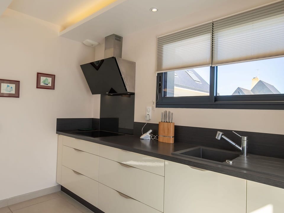 Kitchen, Countertop, Interior Design, Cabinetry, Light Fixture, Wood, Flooring, Ceiling, Furniture, Home