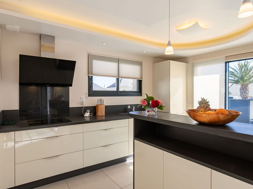 Furniture, Kitchen, Interior Design, Cabinetry, Countertop, Flooring, Light Fixture, Ceiling, Home, Wood