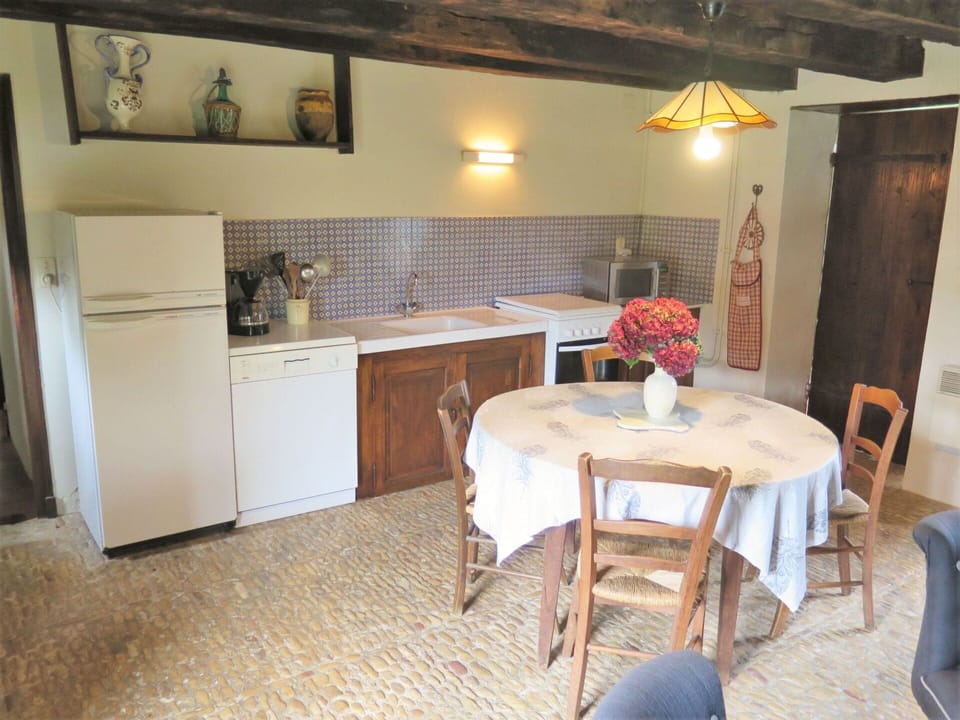 Furniture, Table, Cabinetry, Countertop, Chair, Flower, Wood, Interior Design, Floor, Flooring