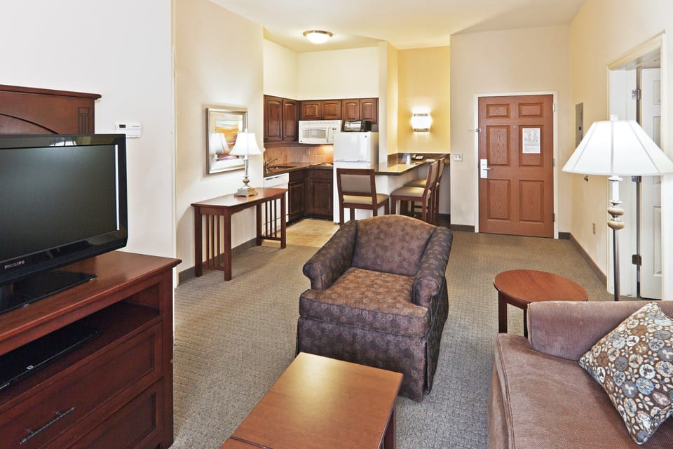Sink into the cozy sofa after a day exploring the area.