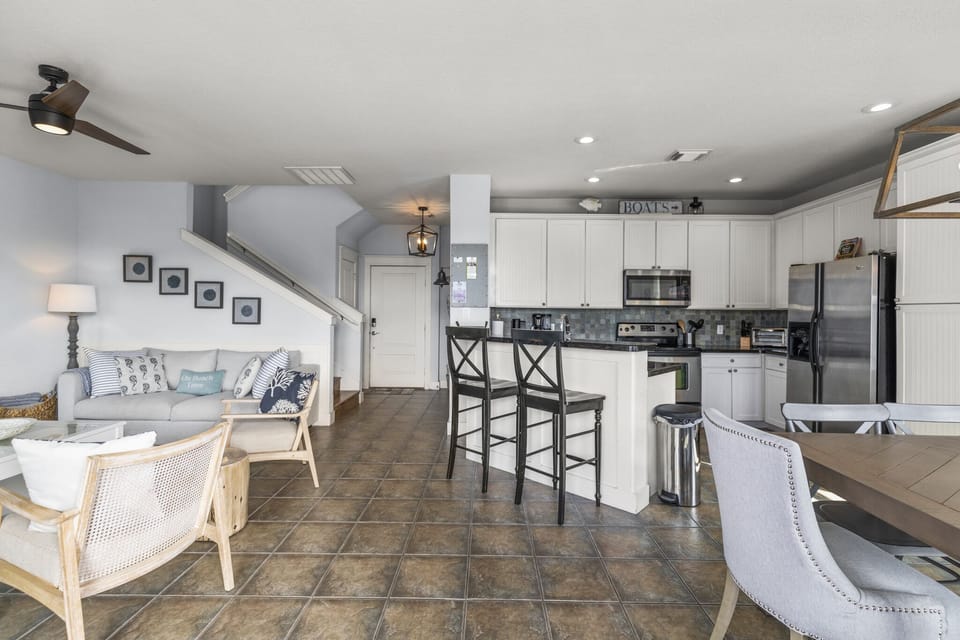 Sit down at the Breakfast Bar for extra seating.