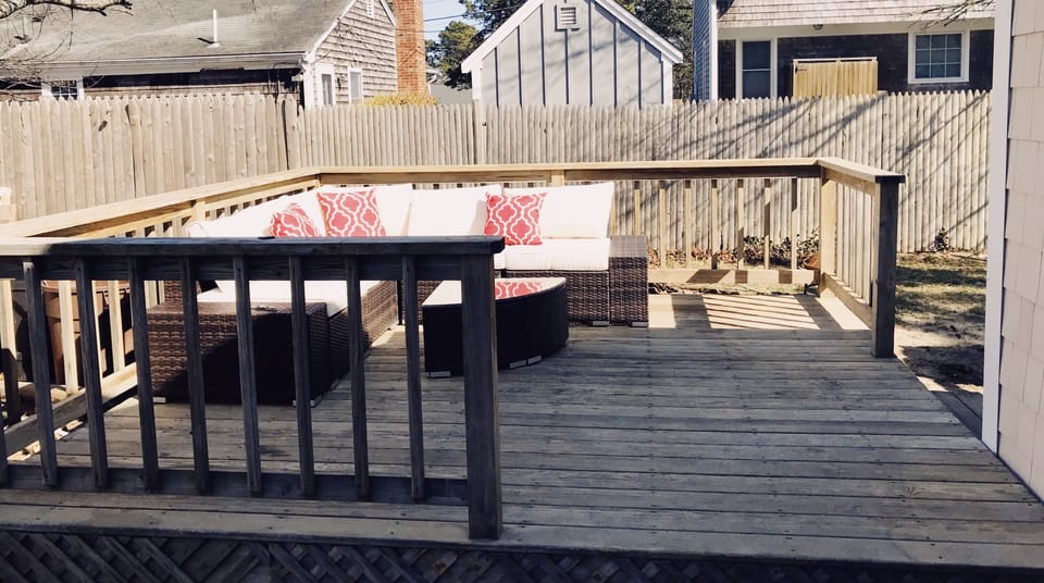 Outdoor deck and fenced-in yard