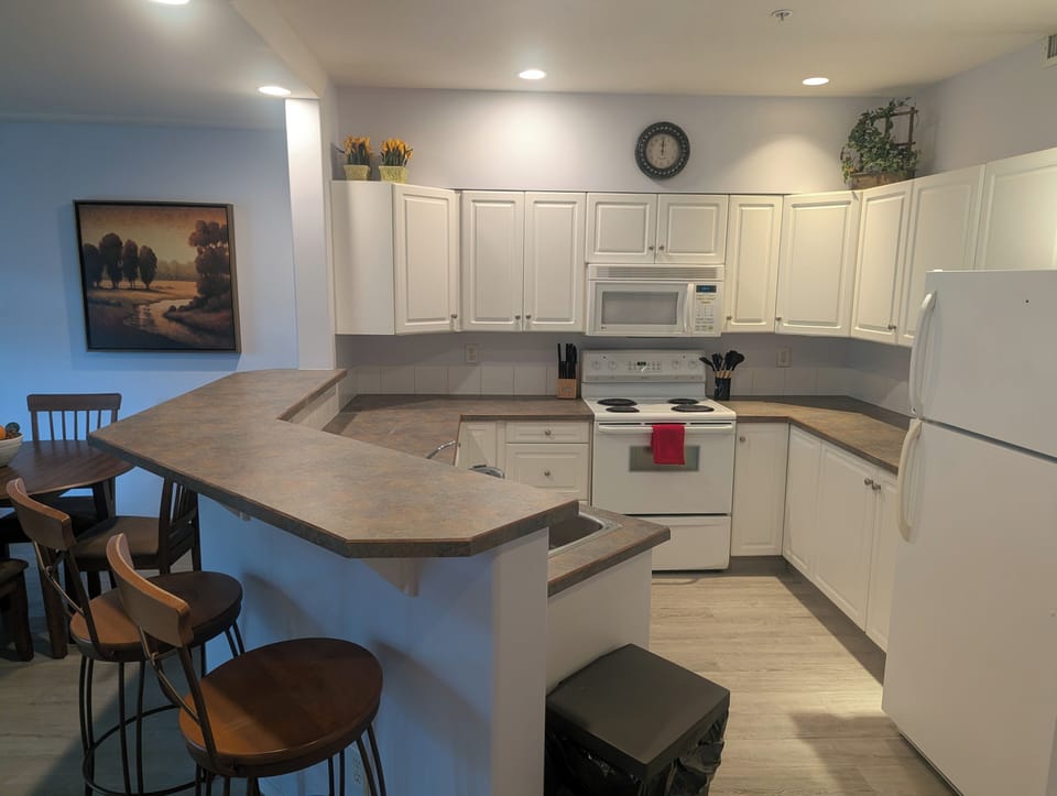 There is also a toaster and coffee maker in this kitchen