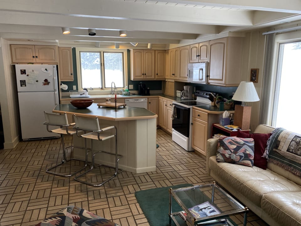 Kitchen  with adjacent seating area