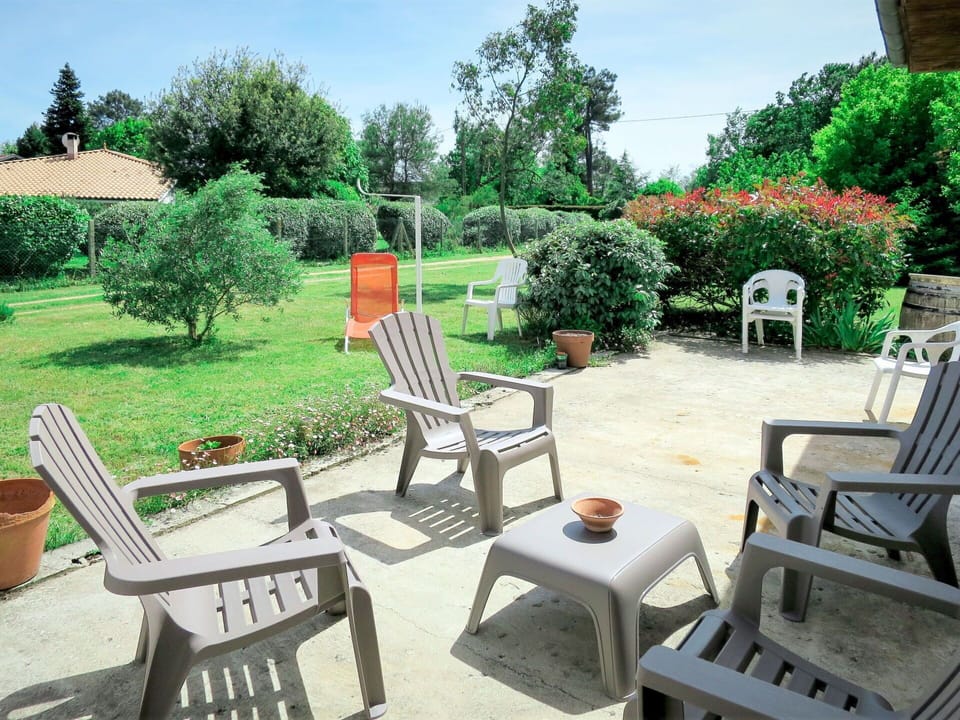 Furniture, Property, Chair, Patio, Yard, Garden, Backyard, House, Landscaping, Lawn