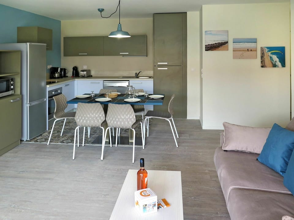 Table, Furniture, Cabinetry, Countertop, Lighting, Wood, Interior Design, Flooring, Floor, Living Room