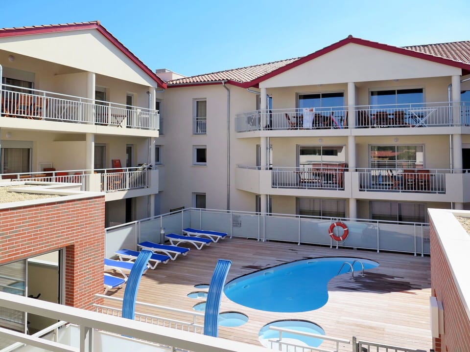 Sky, Water, Property, Building, Swimming Pool, Window, Azure, Shade, Condominium, Urban Design
