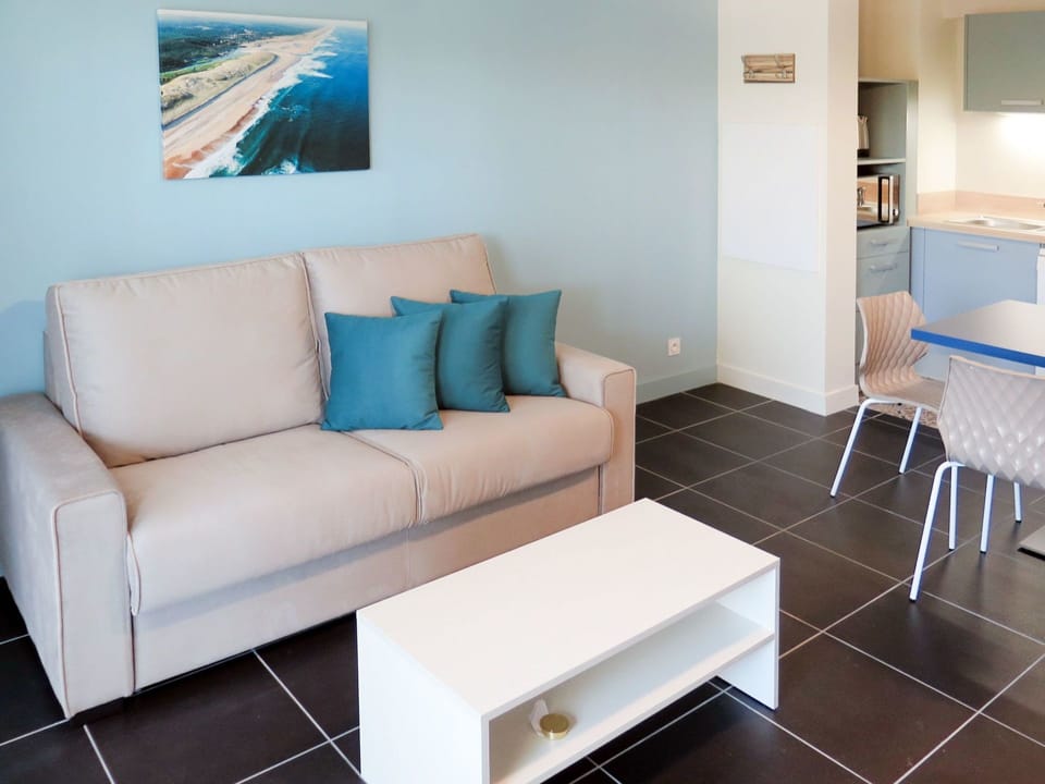 Furniture, Room, Living Room, Property, Turquoise, Interior Design, Blue, Floor, Couch, Wall