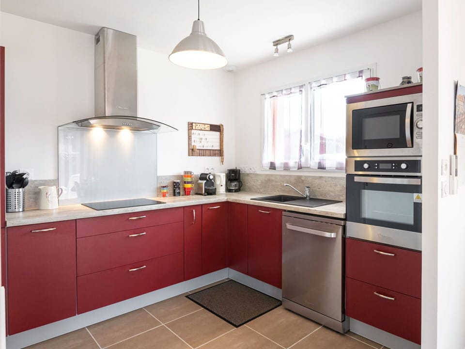 Cabinetry, Countertop, Furniture, Kitchen Appliance, Kitchen Stove, Home Appliance, Kitchen, Drawer, Wood, Lighting