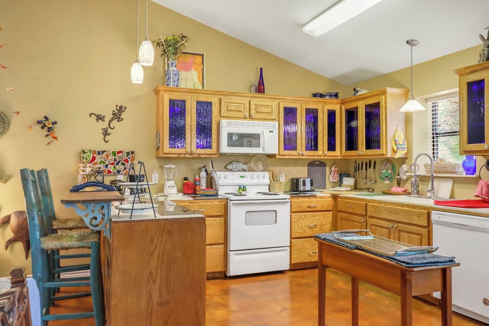 Full kitchen with stove, oven, dishwasher, refrigerator, and microwave