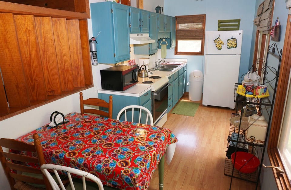Kitchen with microwave, stove, oven, and dishwasher