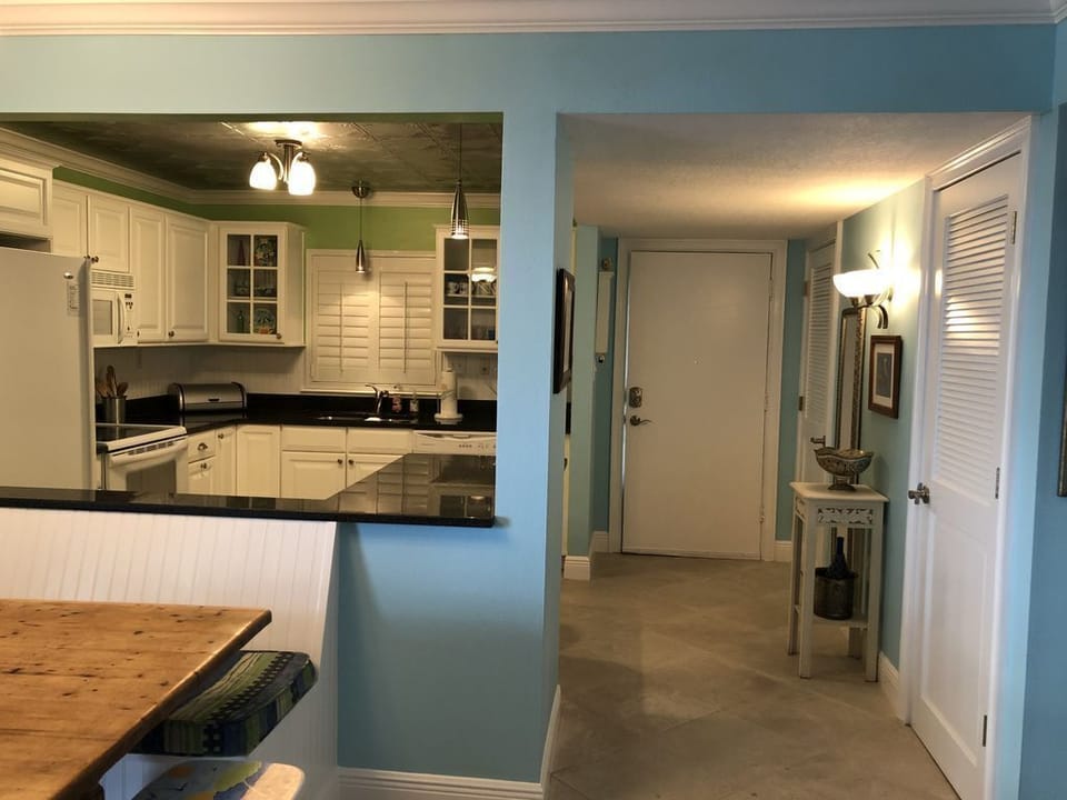 Gorgeous well stocked kitchen, built in booths around dinning room table