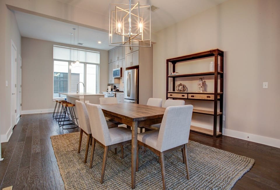 Dining table and kitchen bar seating view