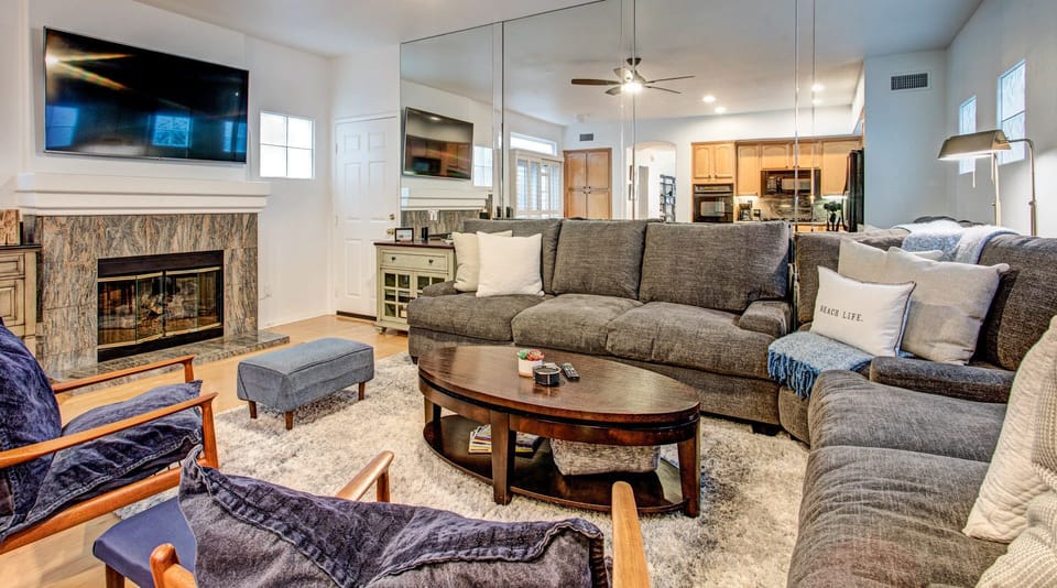 Enjoy a movie with the whole family on the massive wrap around couch and Smart TV

The fireplace is to not be utilized.