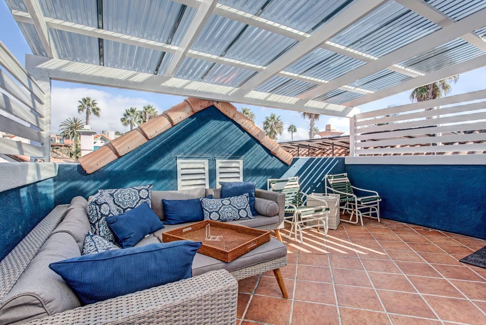 Rooftop deck lounging and seating area.