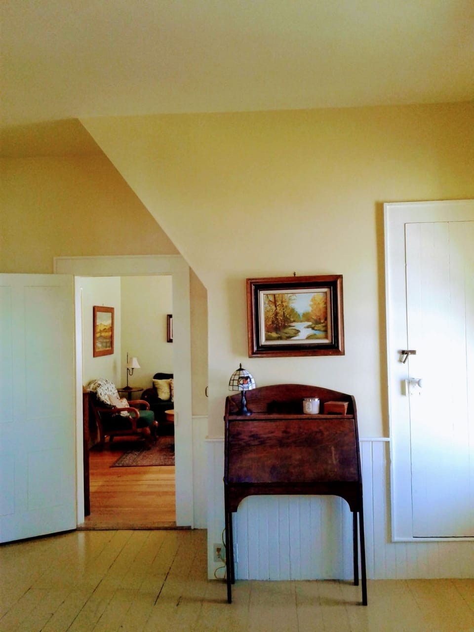 Dining room to parlor with antique details.