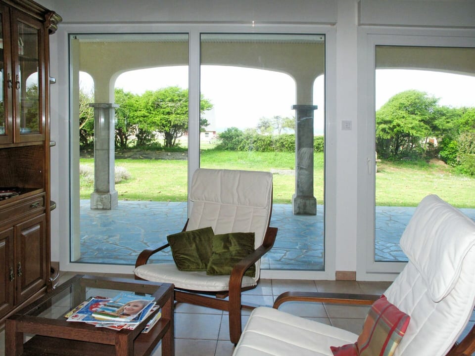 Plant, Property, Furniture, Building, Shade, Table, Cabinetry, Comfort, Interior Design, Wood