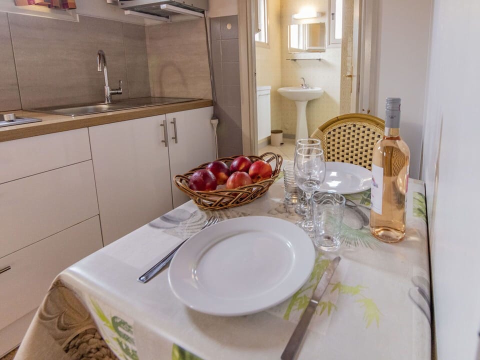Furniture, Cabinetry, Property, Tableware, Dishware, Kitchen Sink, Sink, Countertop, Table, Tap