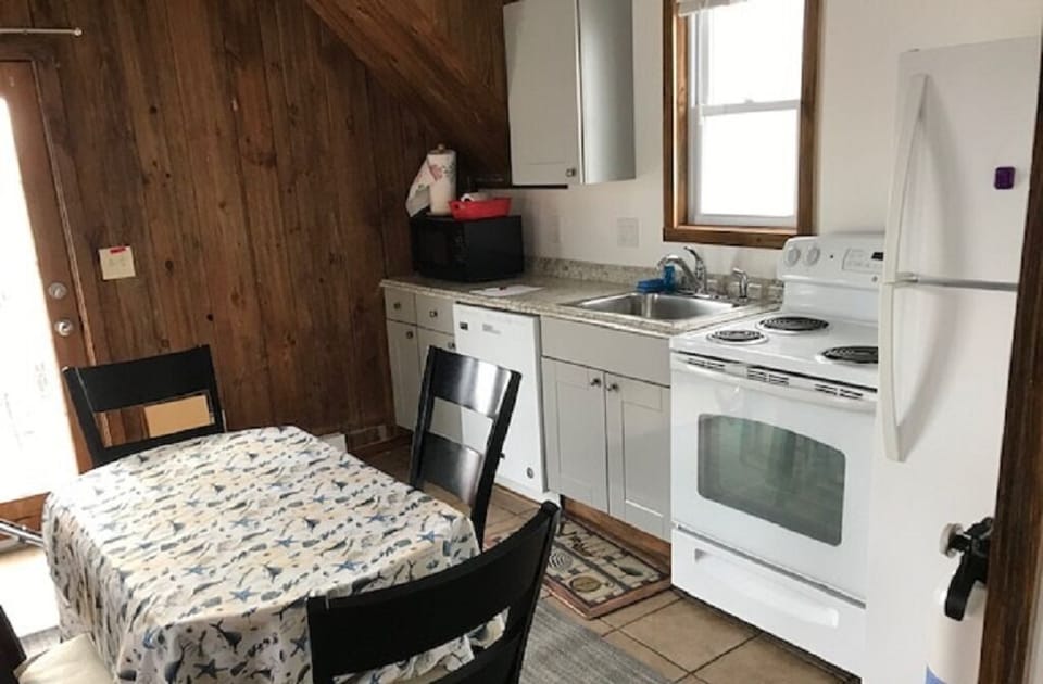 Fully appliance with new cabinets and dishwasher
