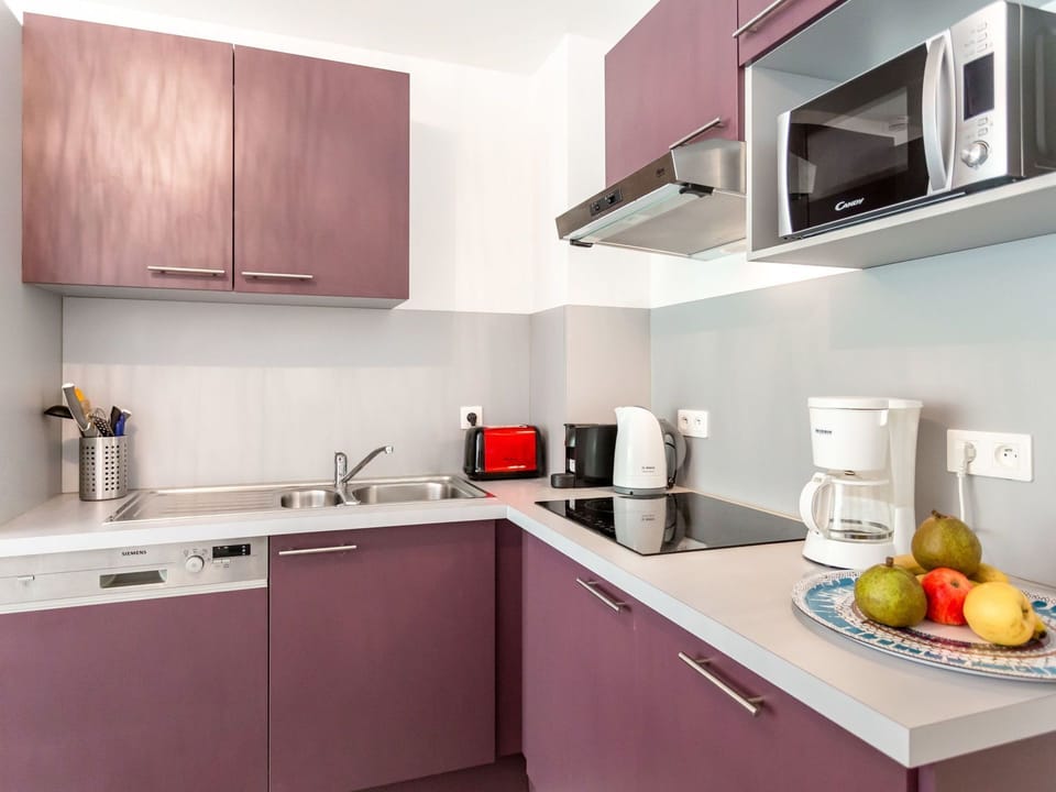 Countertop, Room, Kitchen, Cabinetry, Furniture, Property, Interior Design, Purple, Kitchen Stove, Tile