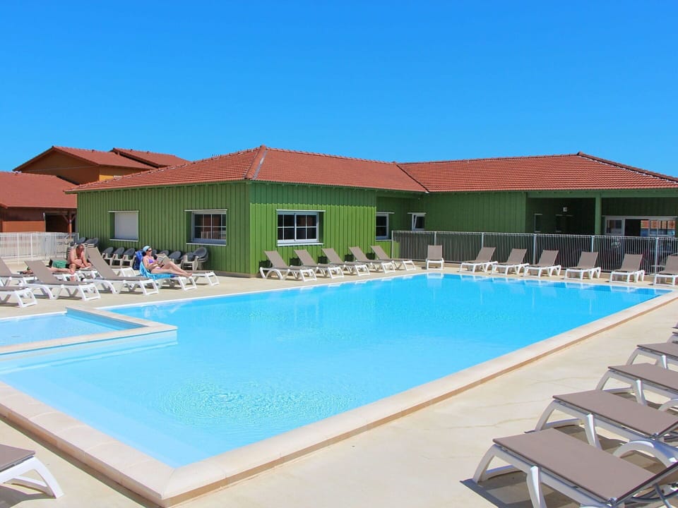 Water, Sky, Building, Property, Swimming Pool, Azure, Shade, Outdoor Furniture, House, Chair
