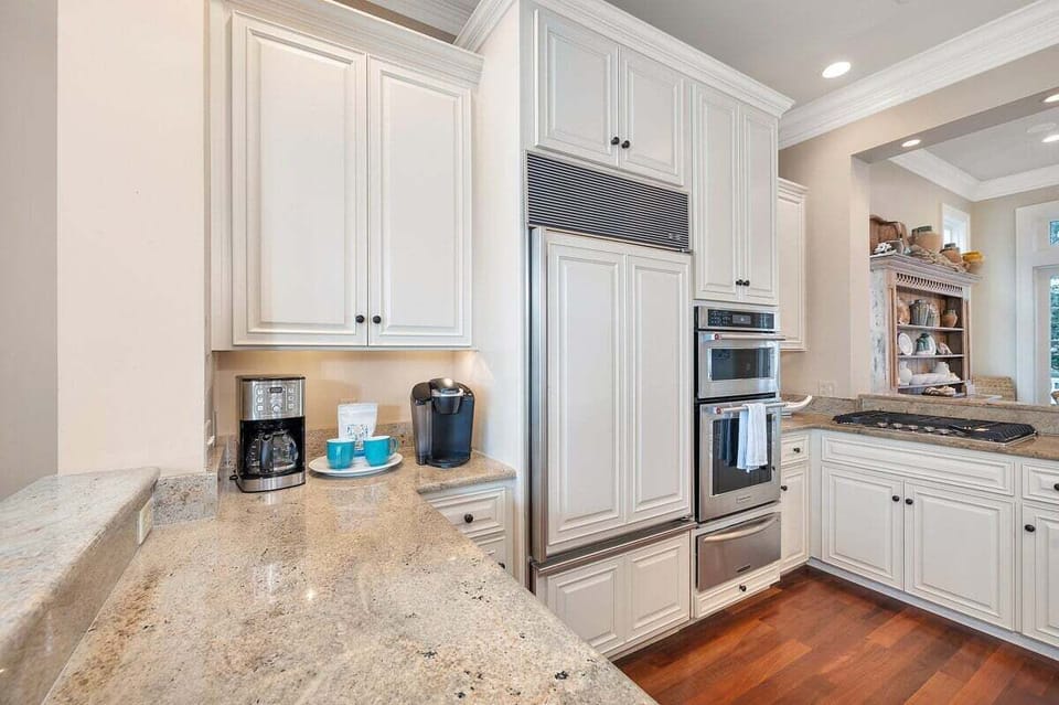 Alternate view of modern kitchen with stainless steel appliances