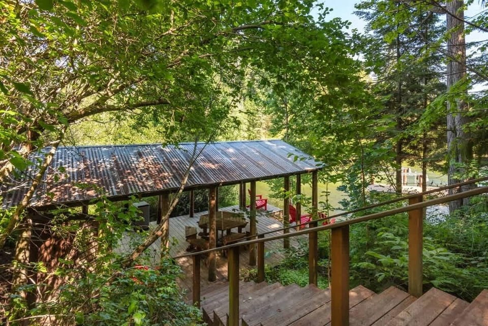 Stairway to the amazing beach area, boat dock and teepee