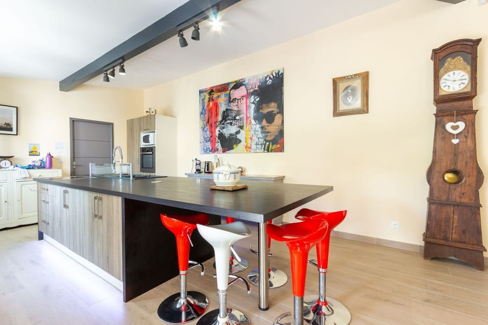 The kitchen, the door leads to a utility room and separate wc