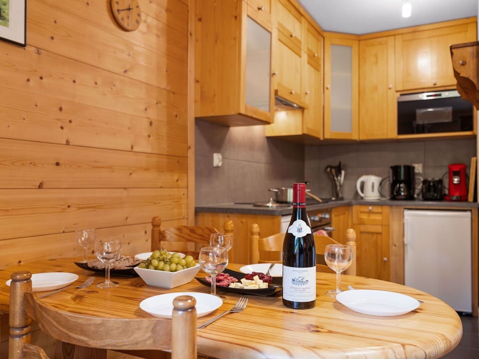 Table, Food, Cabinetry, Property, Furniture, Countertop, Tableware, Bottle, Wood, Interior Design