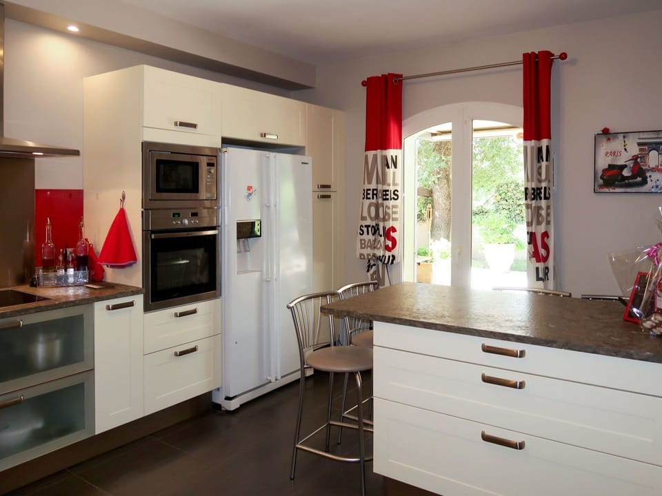 Countertop, Room, Property, Kitchen, Furniture, Cabinetry, Red, Interior Design, Building, Drawer