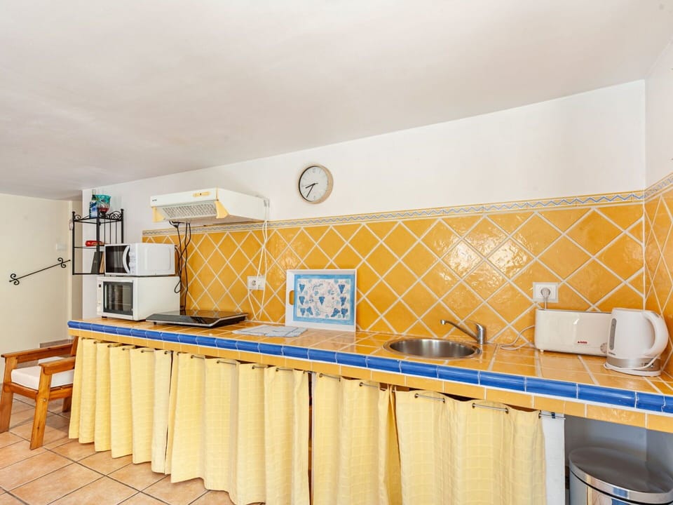 Building, Cabinetry, Countertop, Orange, Wood, Kitchen, Interior Design, Tap, House, Floor