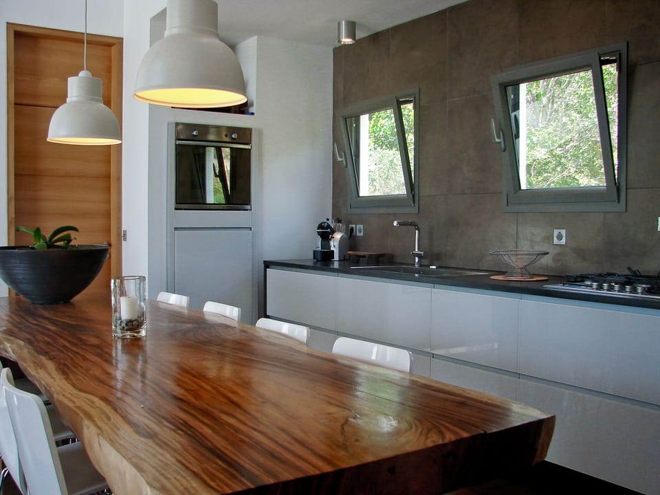 Valcucina suspended glass kitchen with slate countertop