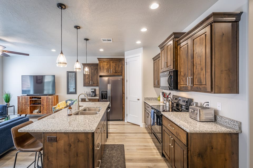 Kitchen Side View - This sleek, modern kitchen has all the best upgrades to make cooking a breeze!