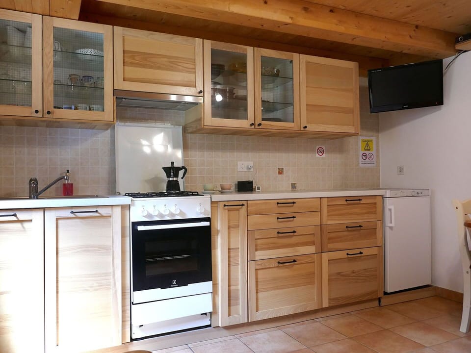 Furniture, Cabinetry, Wood, Flooring, Kitchen, Drawer, Cupboard, Interior Design, Major Appliance, Kitchen Appliance