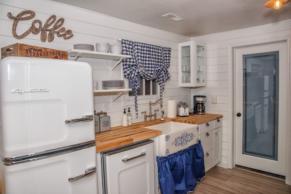 Farmhouse kitchen with fun retro appliances, refrigerator, professional grade gas stove top and oven from Italy, dishwasher, drip coffee maker and much more.