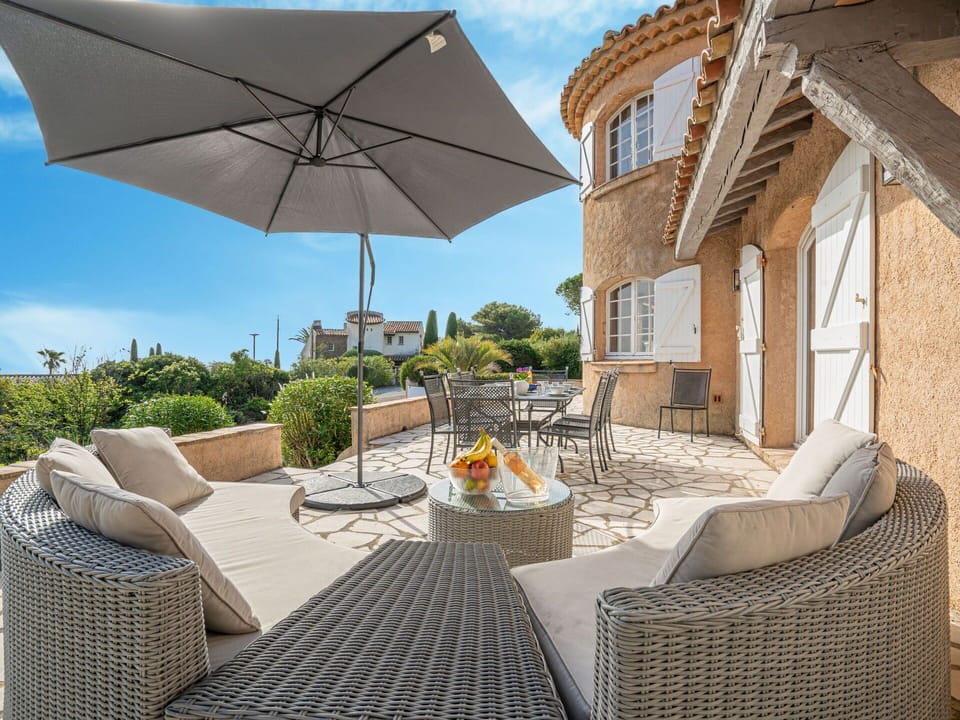 Sky, Furniture, Table, Building, Plant, Umbrella, Shade, Chair, Outdoor Furniture, Interior Design