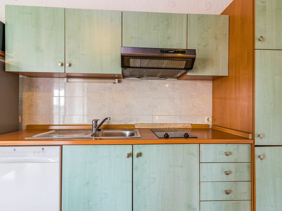 Cabinetry, Kitchen Sink, Countertop, Sink, Kitchen, Wood, Building, Interior Design, Kitchen Stove, Wood Stain