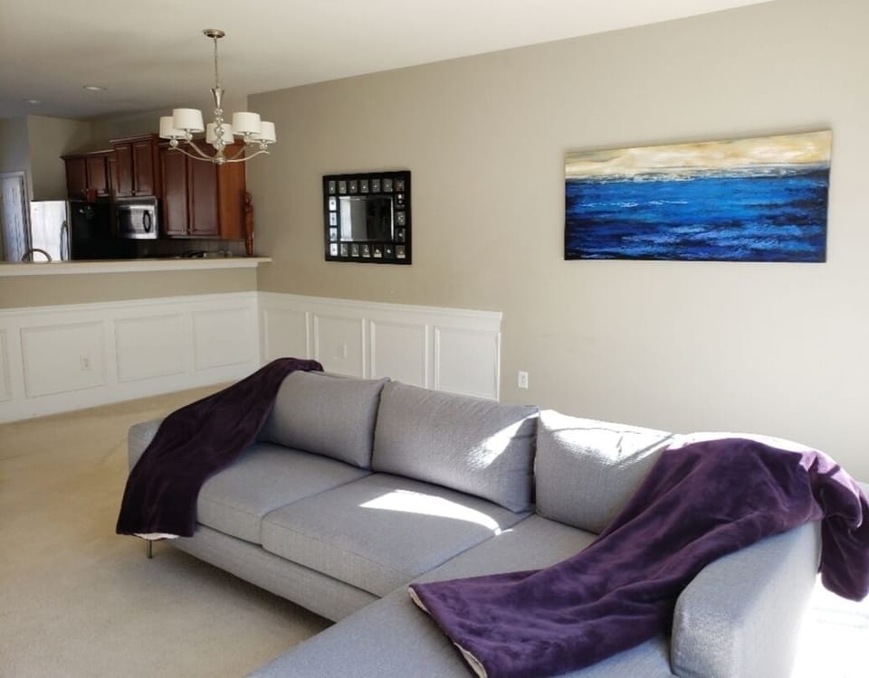Kitchen opens to living room