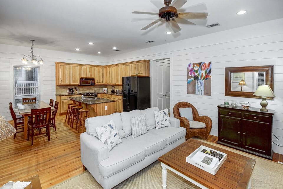 Open-concept living, dining, and kitchen areas