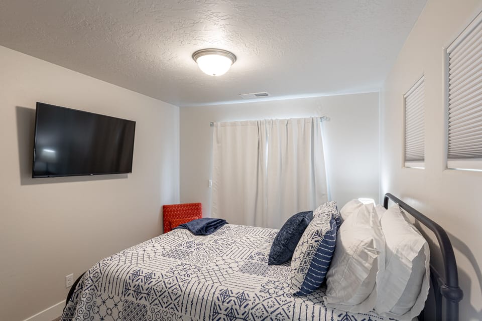 Bedroom 3 - Bedroom 3 includes a Queen bed, private TV, and  closet.