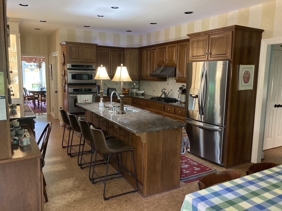 Kitchen from breakfast area looking toward dining room 