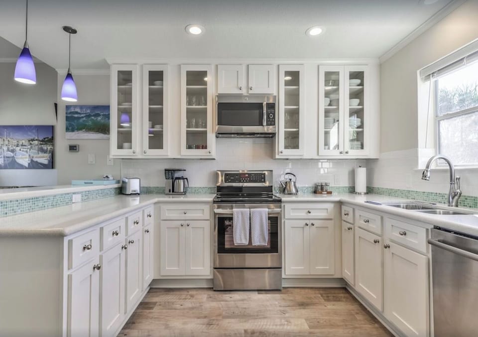 Our beautifully appointed, fully stocked kitchen is light and bright!