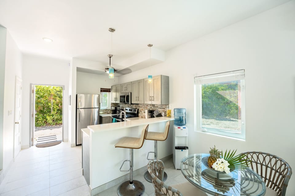 Full kitchen with dining area