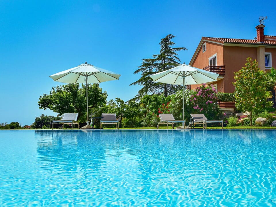 Blue, Swimming Pool, Resort, Outdoor Furniture, Eco Hotel, Sunlounger, Leisure, Resort Town, Umbrella, Landscaping