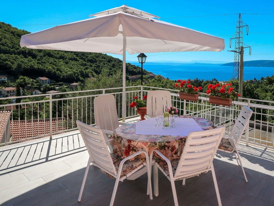 Table, Furniture, Sky, Plant, Property, Flower, Chair, Outdoor Table, Azure, Umbrella