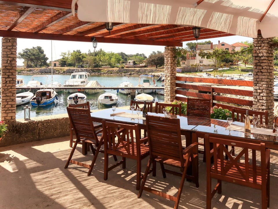 Property, Building, Outdoor Table, Patio, Furniture, Pergola, Real Estate, Table, Shade, Room