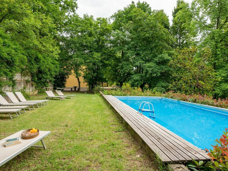Water, Plant, Green, Tree, Outdoor Bench, Shade, Sky, Grass, Natural Landscape, Swimming Pool