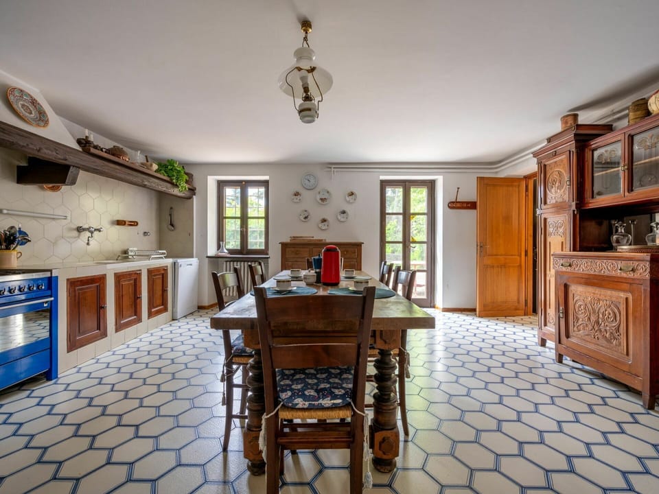 Picture Frame, Cabinetry, Furniture, Property, Wood, Table, Lighting, Interior Design, Chair, Hall