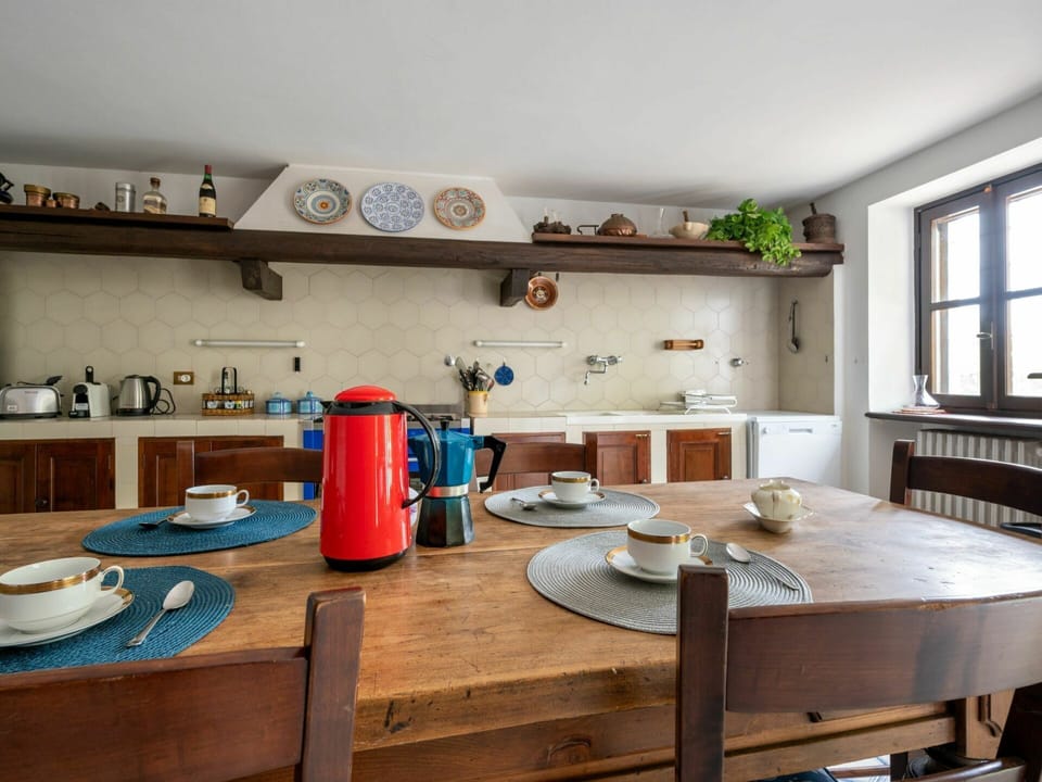 Table, Furniture, Tableware, Cabinetry, Building, Window, Countertop, Kitchen Appliance, Kitchen, Wood